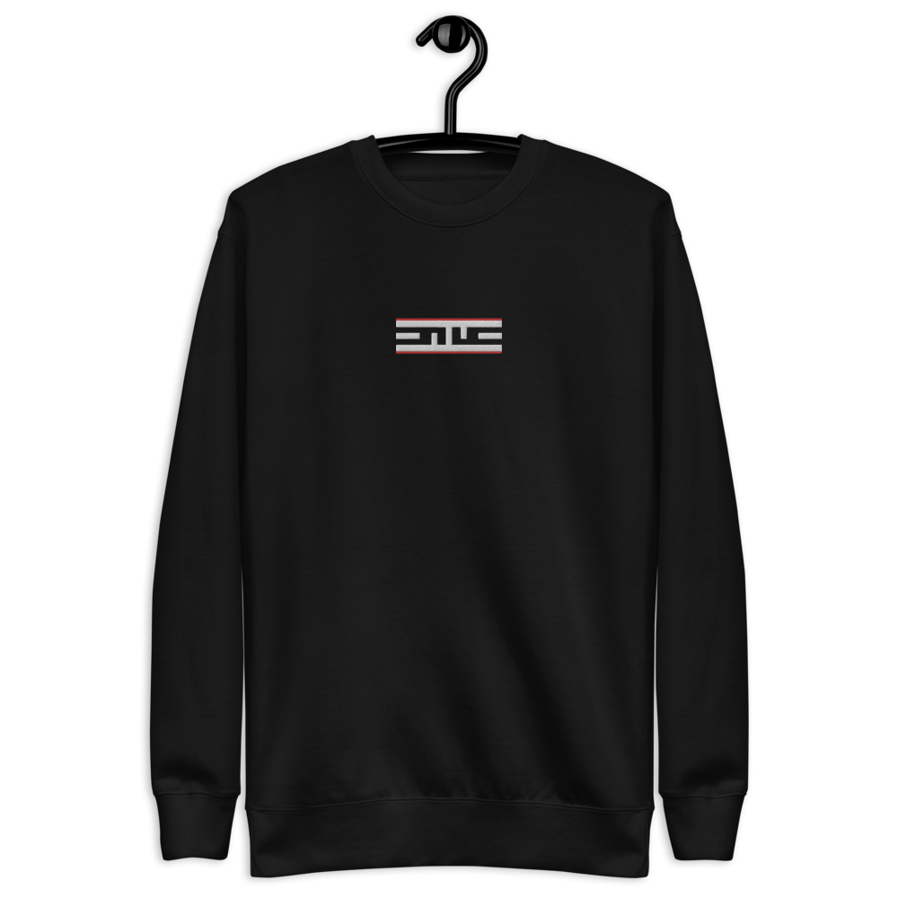 Black crewneck sweatshirt with the embroidered Red Label ELITE® icon, on a hanger